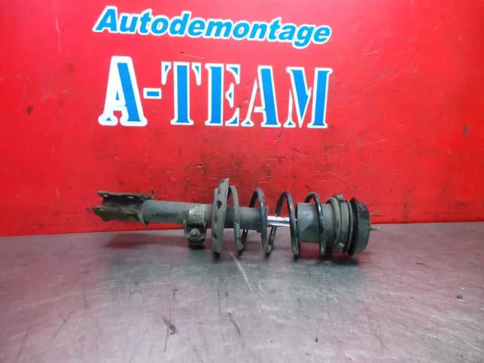 Fronts shock absorber, left Opel Corsa