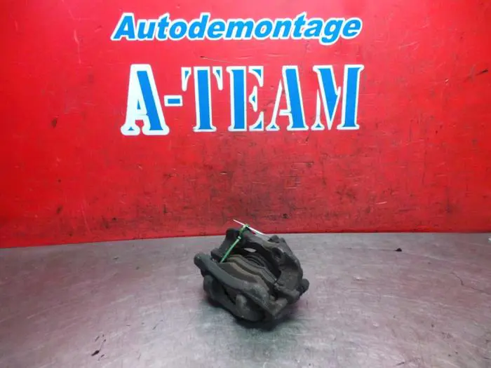 Front brake calliper, left Citroen C2