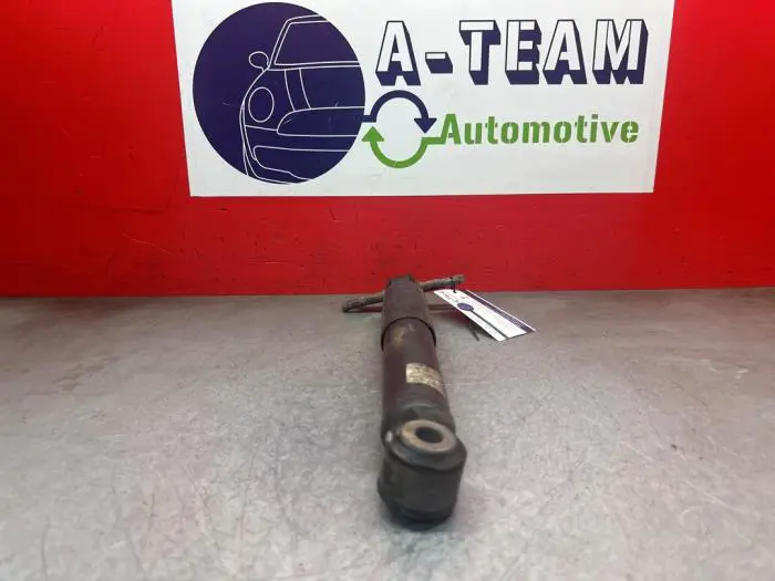 Rear shock absorber, left Opel Combo