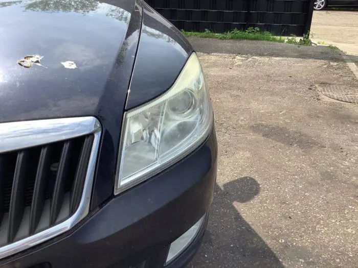 Headlight, left Skoda Octavia