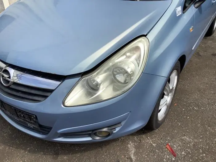 Headlight, left Opel Corsa