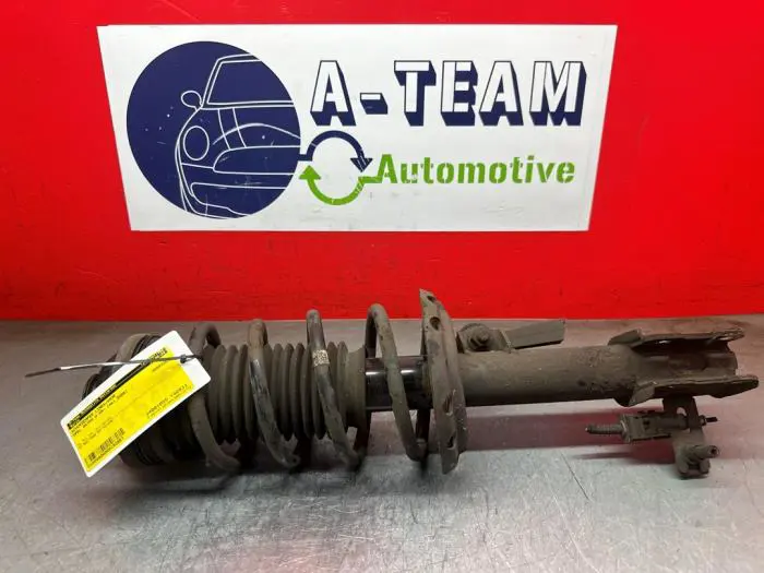 Fronts shock absorber, left Opel Astra