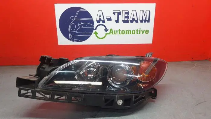 Headlight, left Mazda 3.