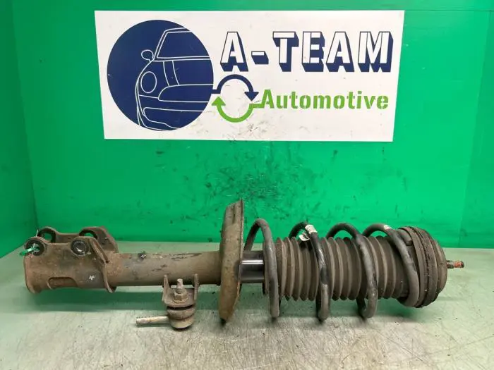 Fronts shock absorber, left Opel Corsa