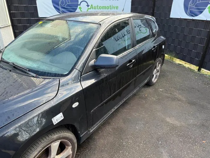 Door 4-door, front left Mazda 3.