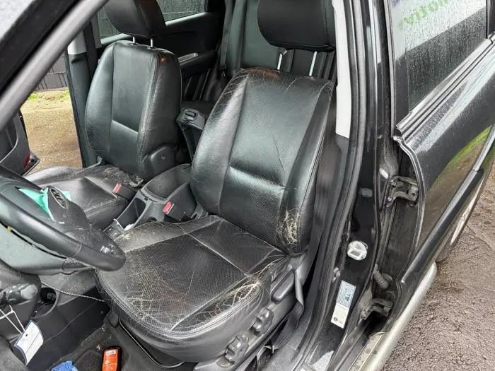 Seat, left Kia Sportage