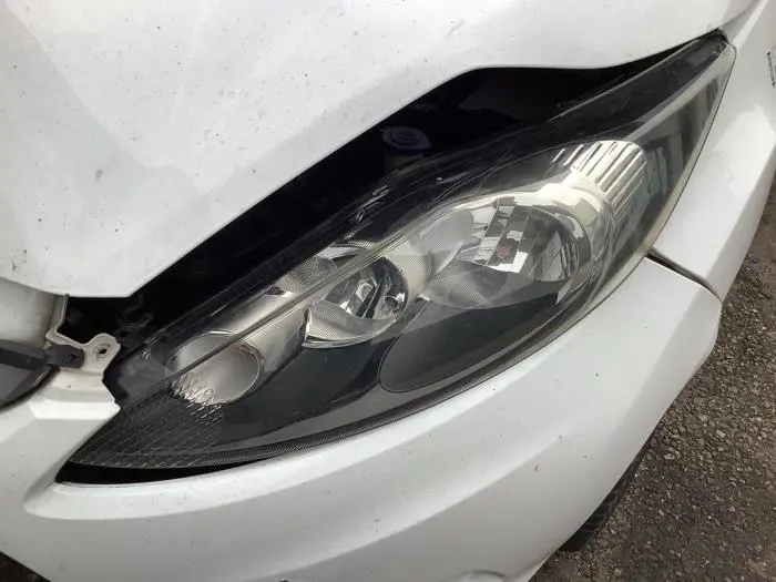 Headlight, left Ford Fiesta