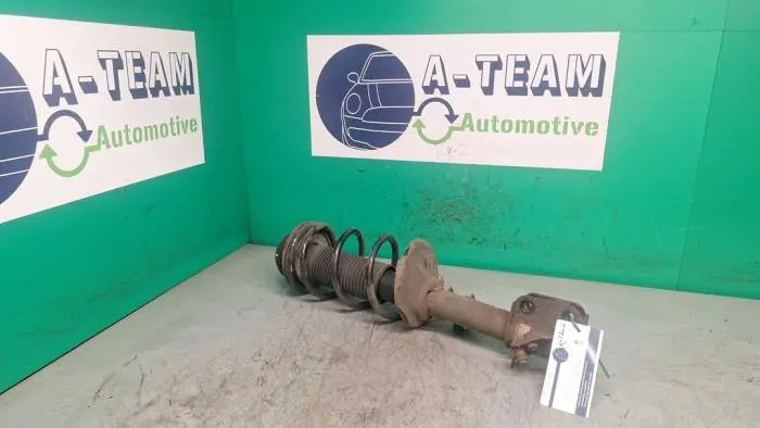 Fronts shock absorber, left Suzuki Alto