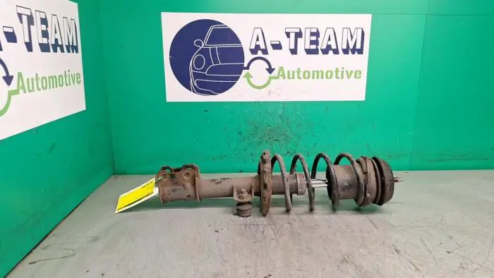 Fronts shock absorber, left Opel Corsa