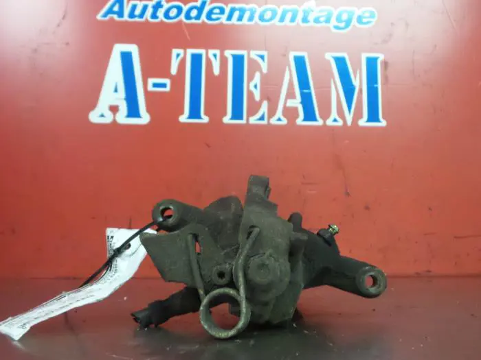 Rear brake calliper, left Volkswagen Transporter