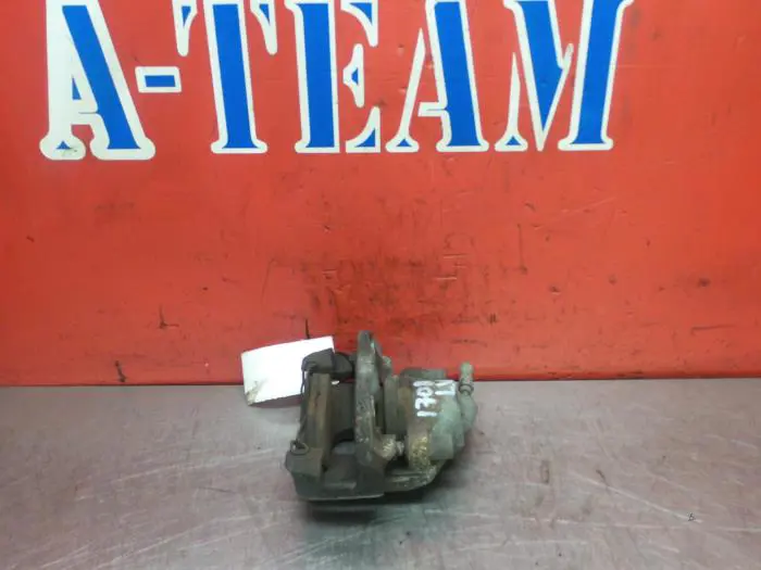 Front brake calliper, left Ford Fiesta